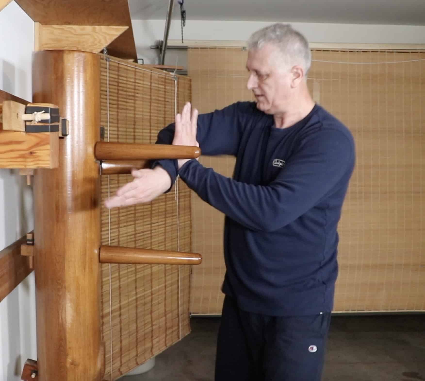 Branko Knezevic demonstrating Bong Sao and Wu Sao combination on the Wing Chun wooden dummy