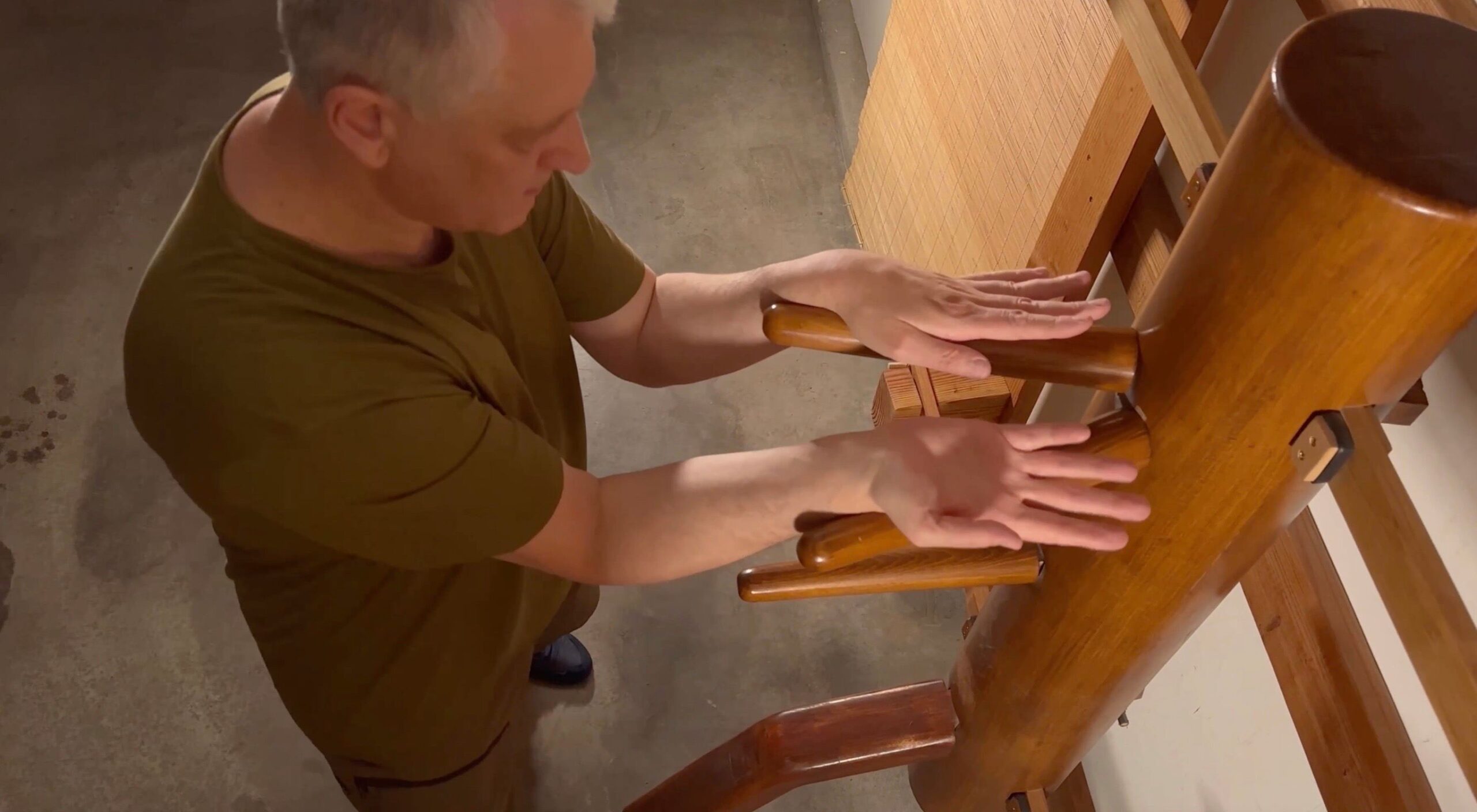 Branko Knezevic demonstrating Jut Sao and Tan Sao combination on the Wing Chun wooden dummy