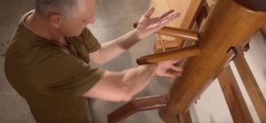 Branko Knezevic demonstrating inside Tan Sao and Bong Sao combination on the Wing Chun wooden dummy
