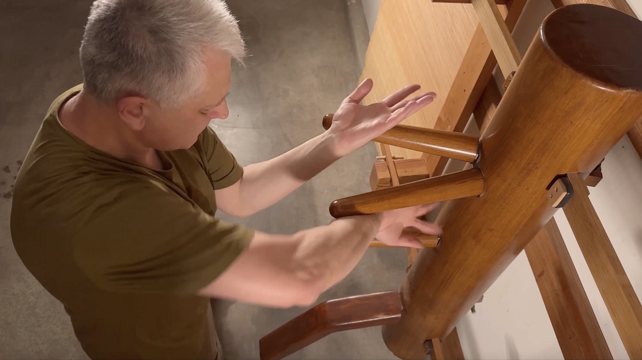 Branko Knezevic demonstrating inside Tan Sao and Bong Sao combination on the Wing Chun wooden dummy